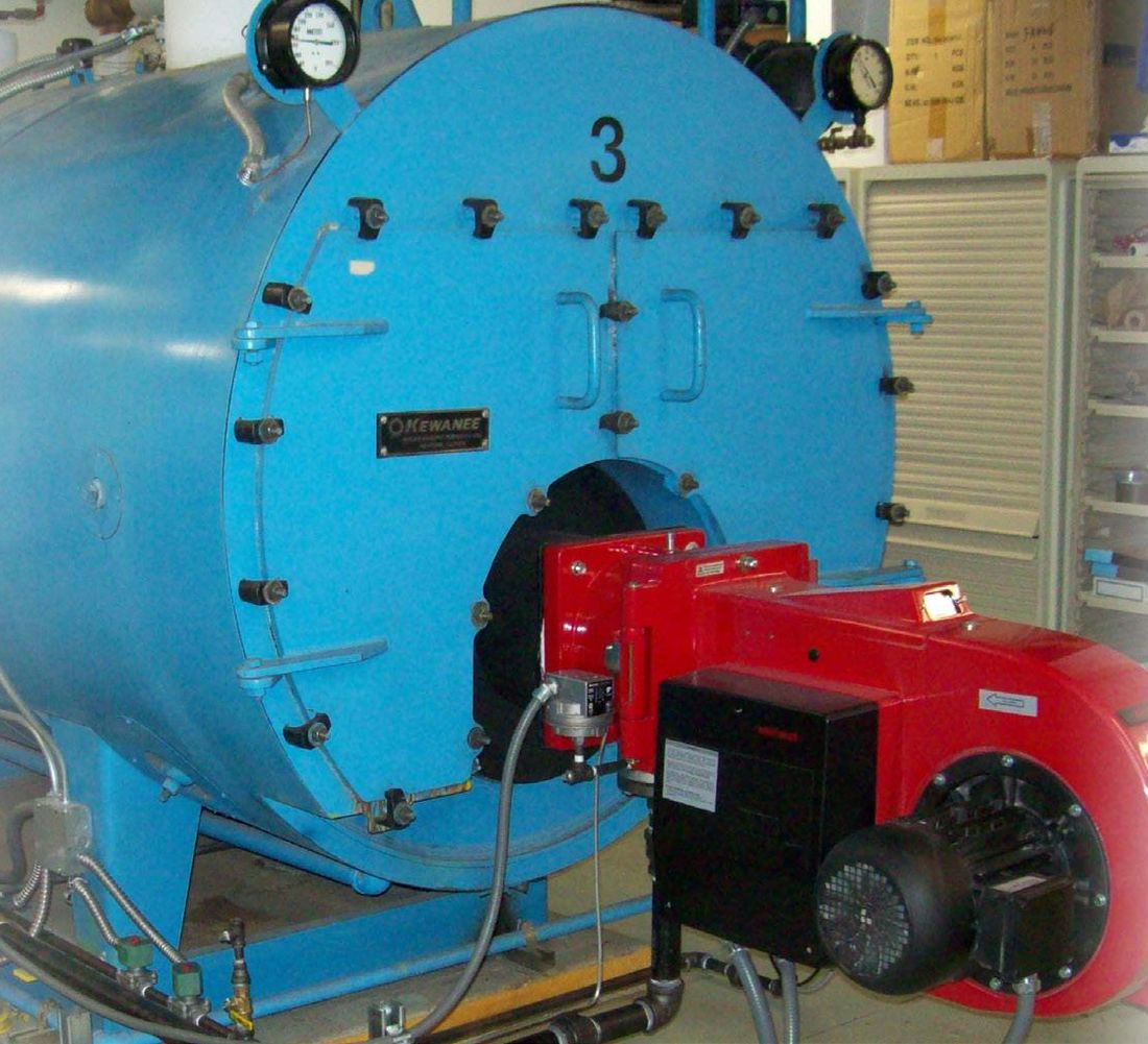 Fire-tube boiler with a red power burner